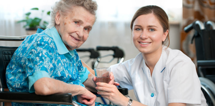 elderly woman and a caregiver